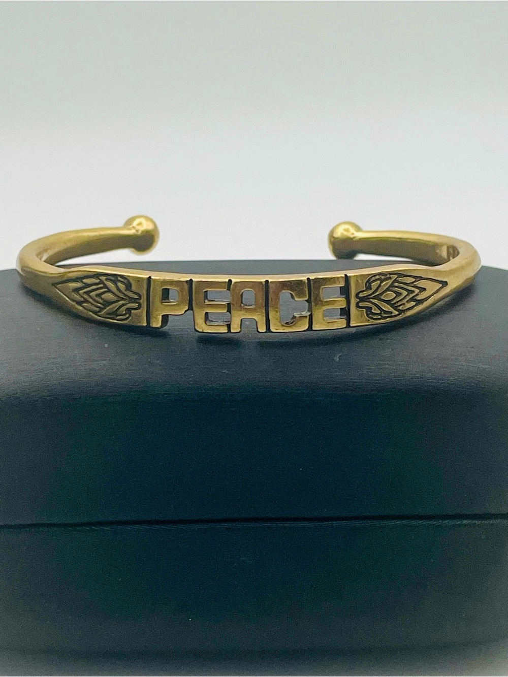 Lucky Brand Gold-Tone "PEACE" Cuff Bracelet with Leaf engravings. Size 6 1/2
